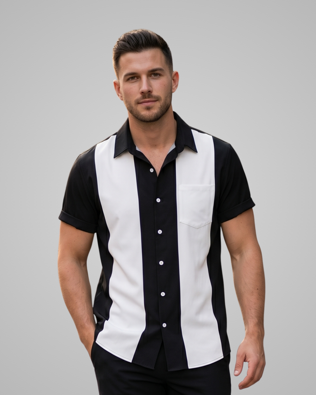 Man wearing a black and white striped shirt against a gray background