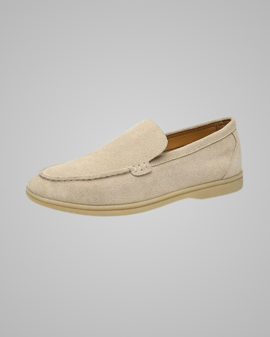 Beige loafer shoe on a gray background