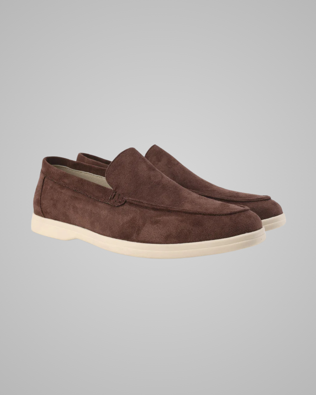 Dark coffee loafer shoe on a light gray background