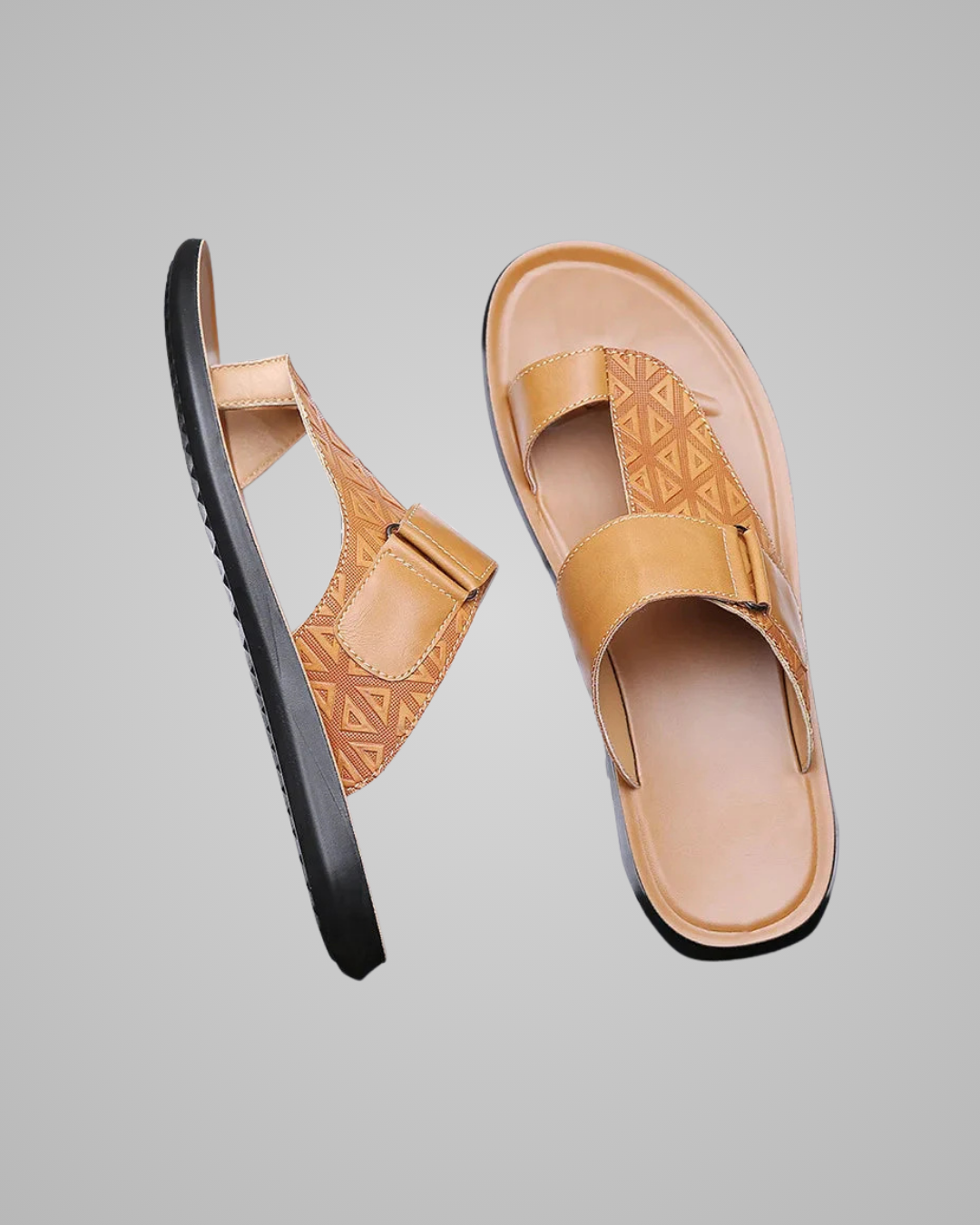 Tan sandals with geometric pattern on a gray background