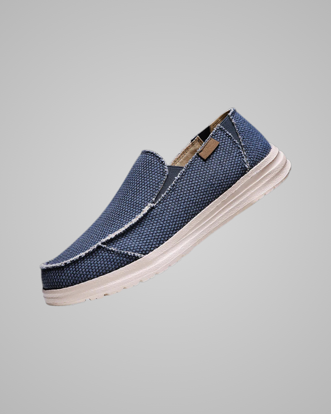 Blue casual shoe on a gray background