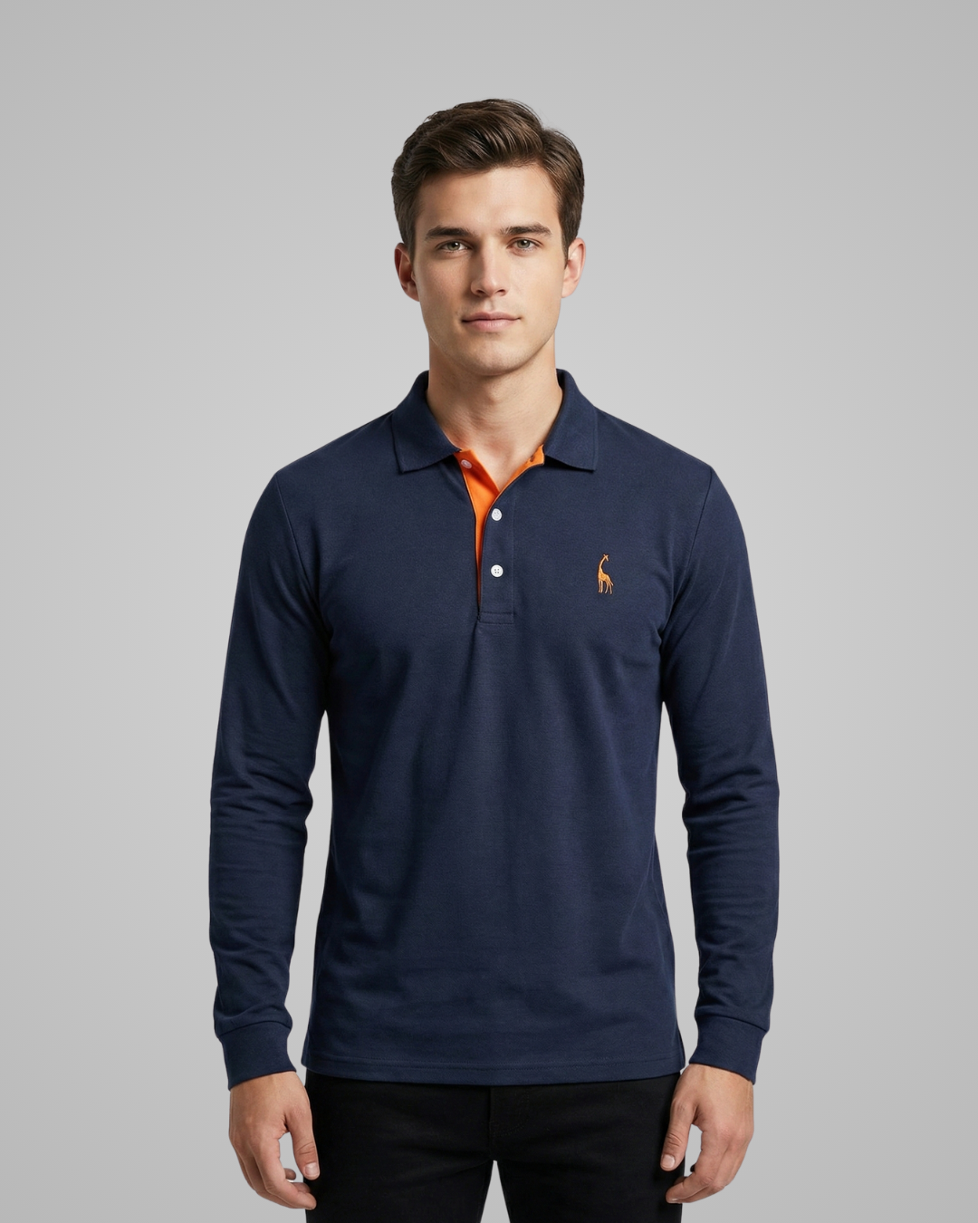 Man wearing a navy long-sleeve polo shirt with a small logo on a gray background
