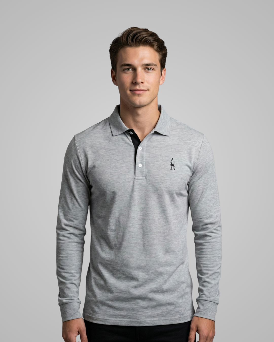 Man wearing a gray long-sleeve polo shirt with a small logo on a gray background