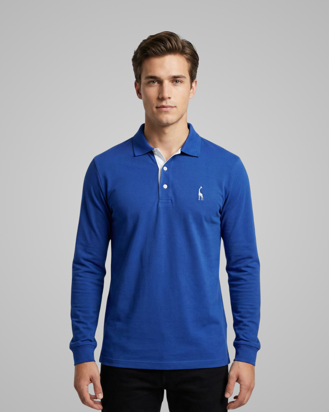 Man wearing a blue long-sleeve polo shirt with a logo on a gray background