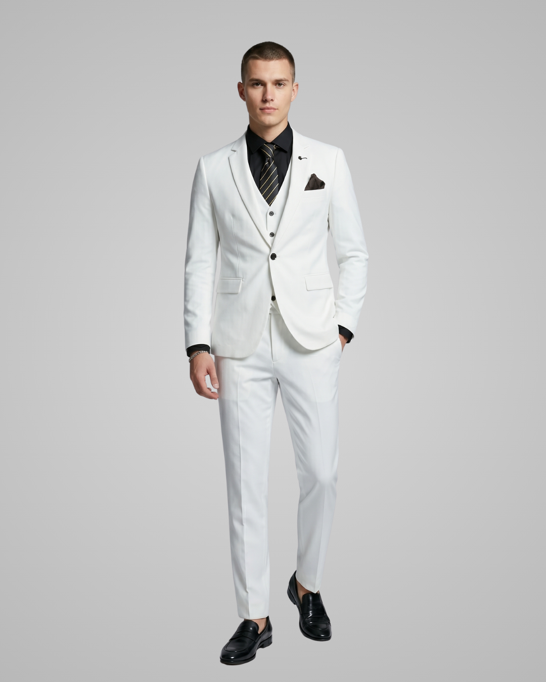 Man wearing a white suit with a tie on a gray background