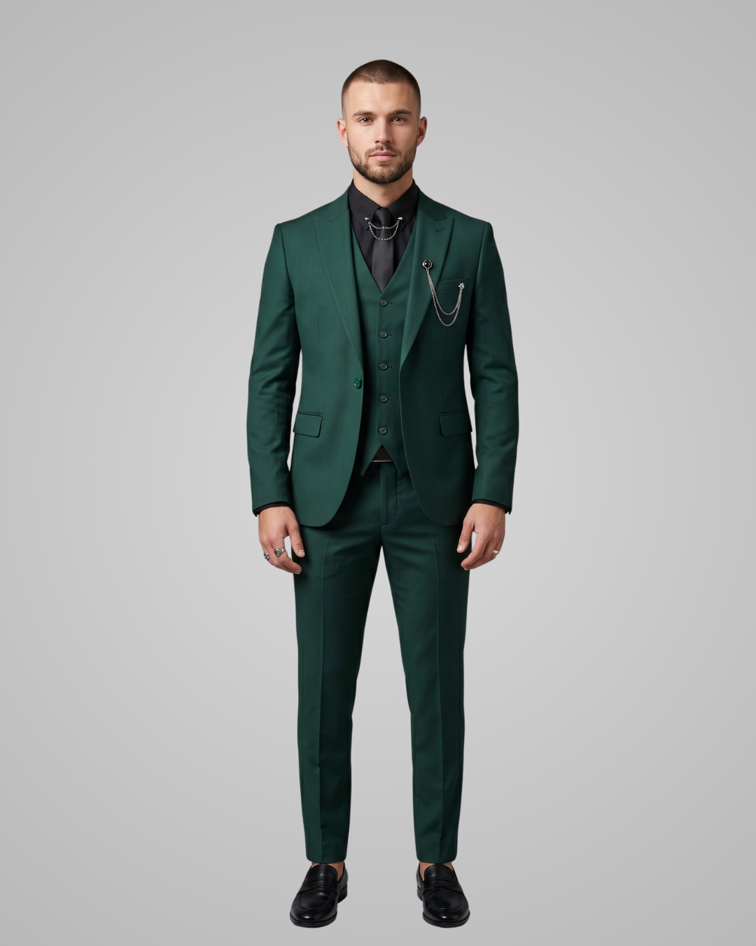 Man wearing a dark green suit on a gray background