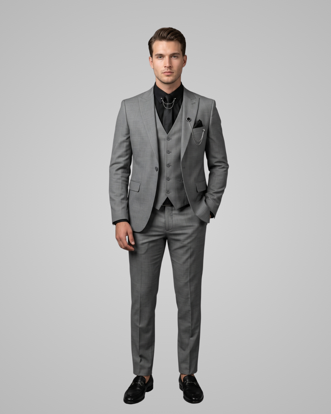 Man wearing a grey suit on a grey background