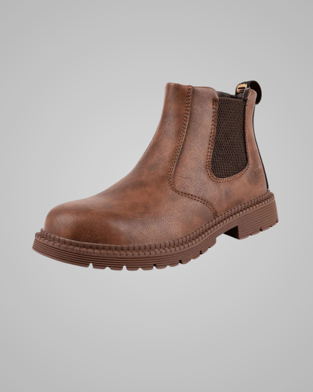 A brown leather Chelsea boot with a dark brown elastic side panel and a low chunky lug sole, shown against a solid gray background.