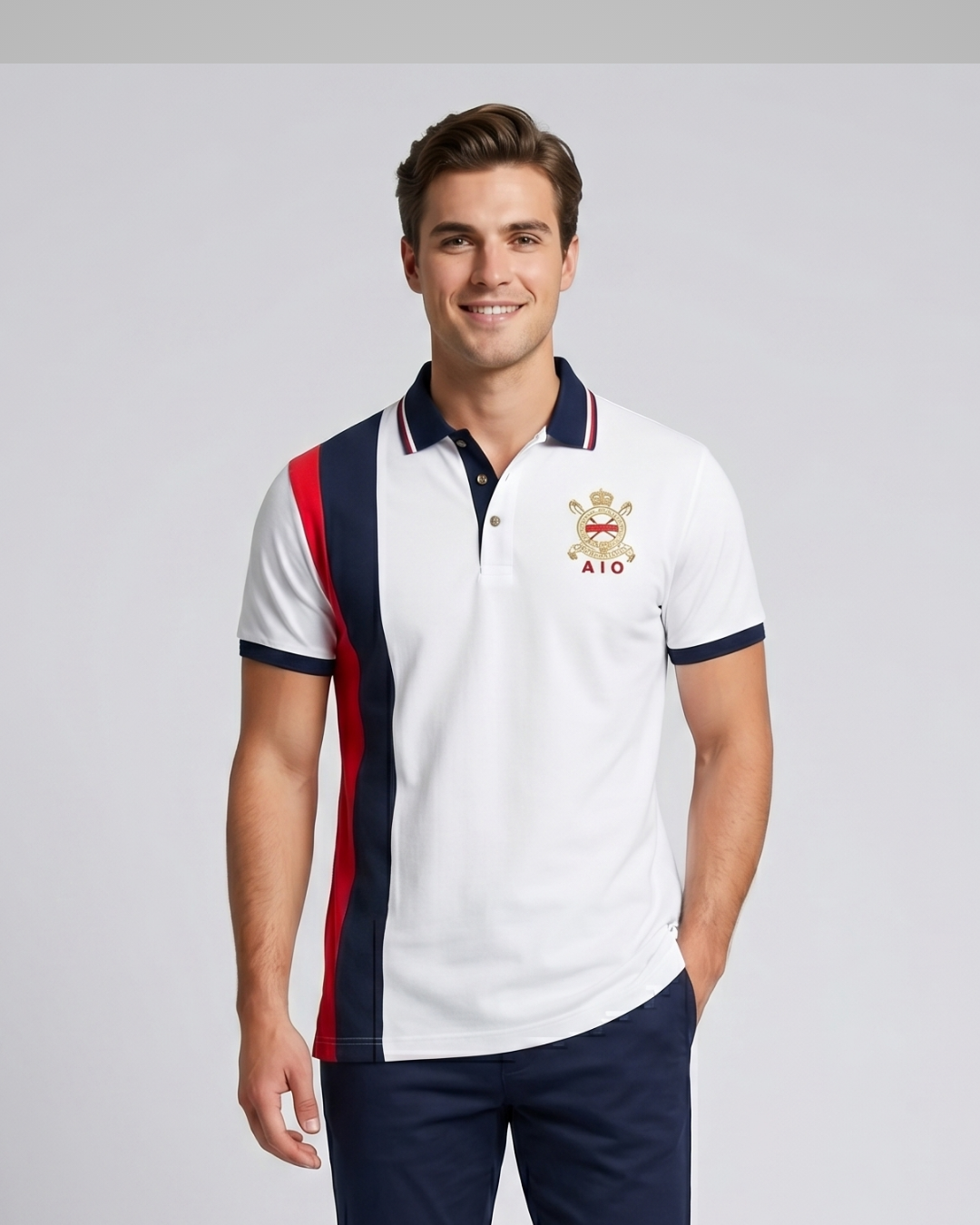 Man wearing a white polo shirt with red and blue accents and a logo on a gray background