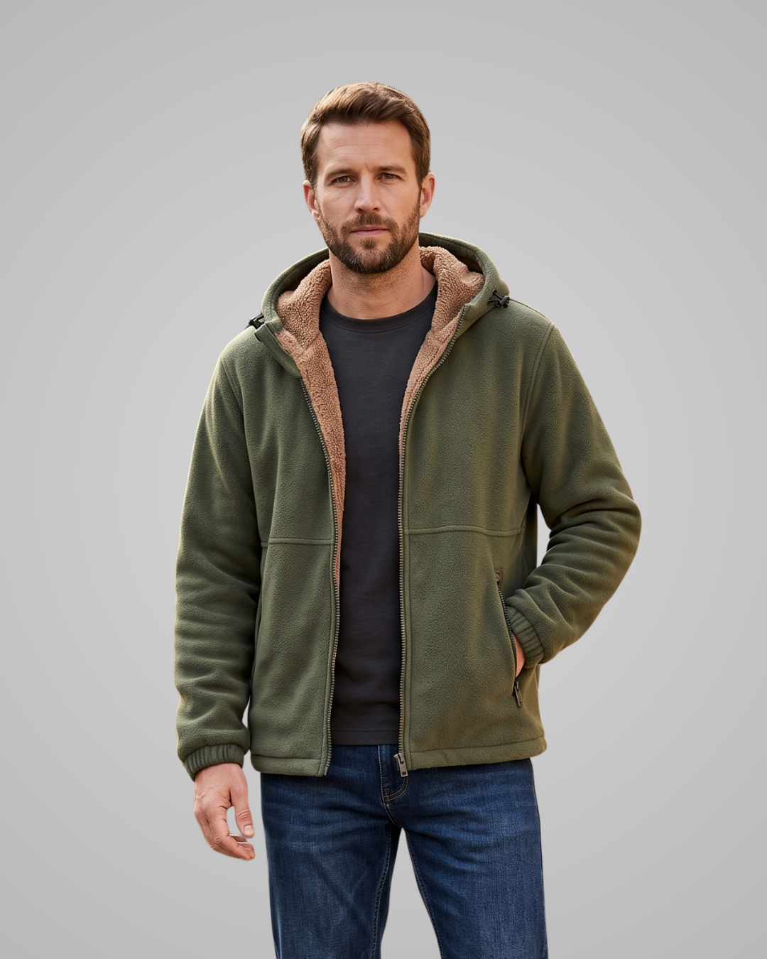 Man wearing a green fleece jacket with brown lining on a gray background