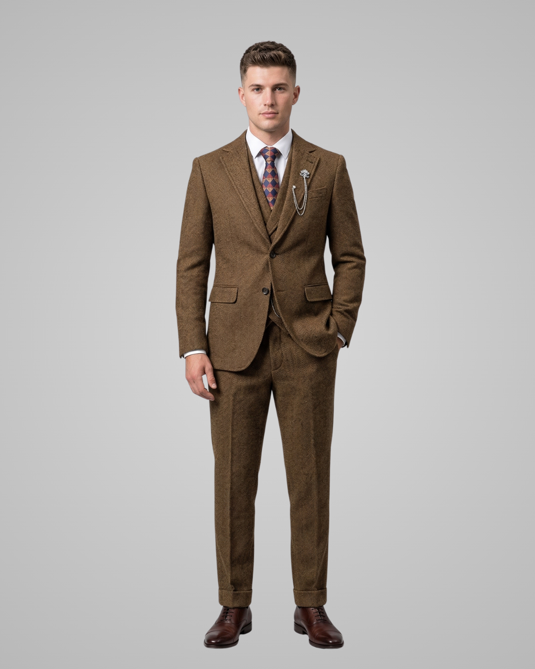 Man wearing a brown suit with a patterned tie on a gray background