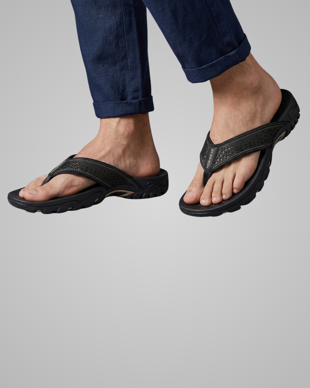 Black sandal on a gray background