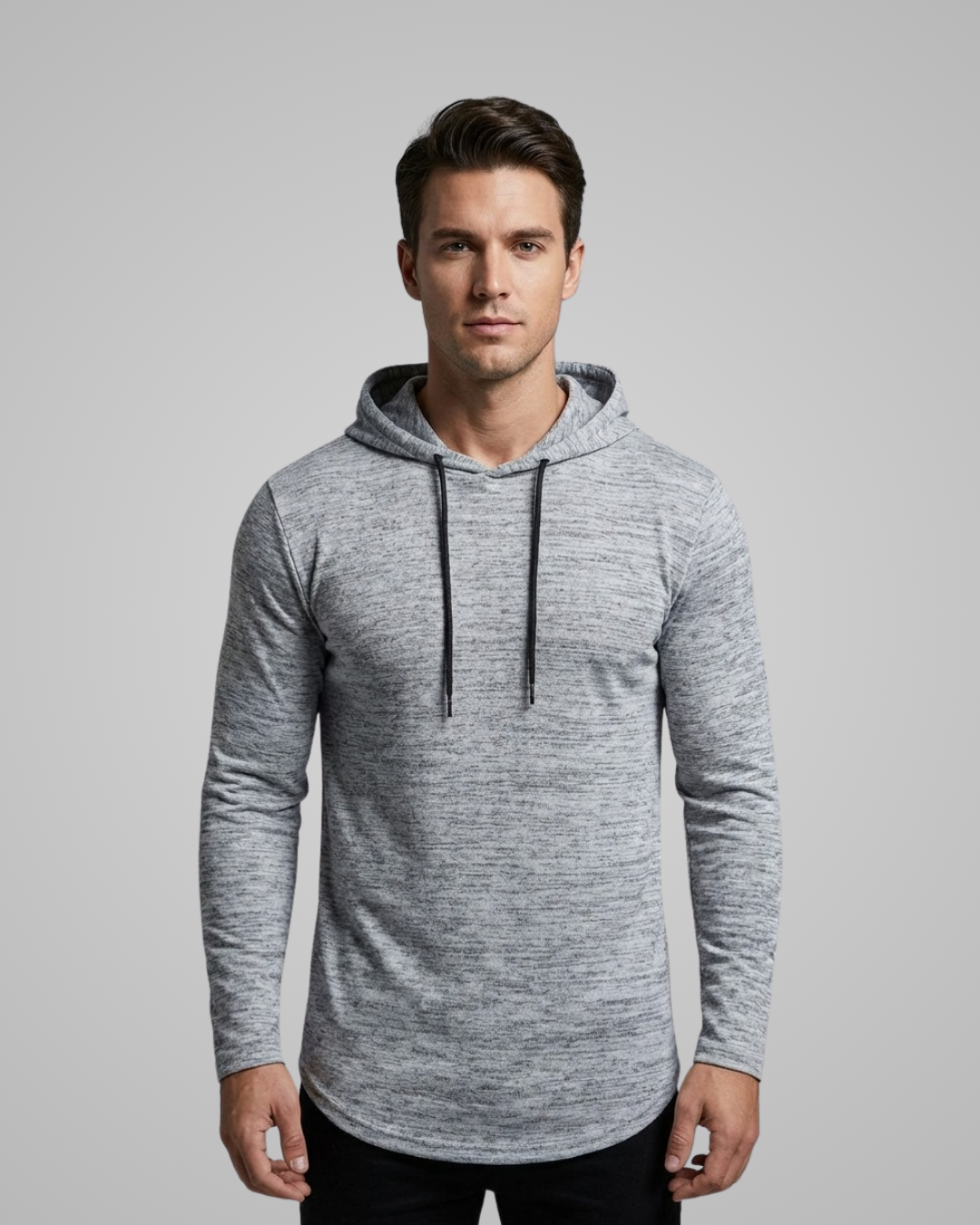 Man wearing a gray hoodie against a plain background
