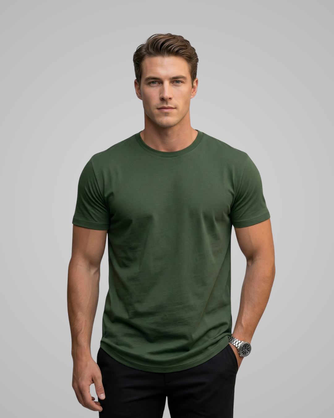 Man wearing a green t-shirt against a gray background