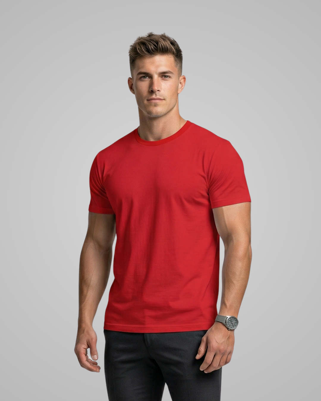 Man wearing a red t-shirt against a gray background