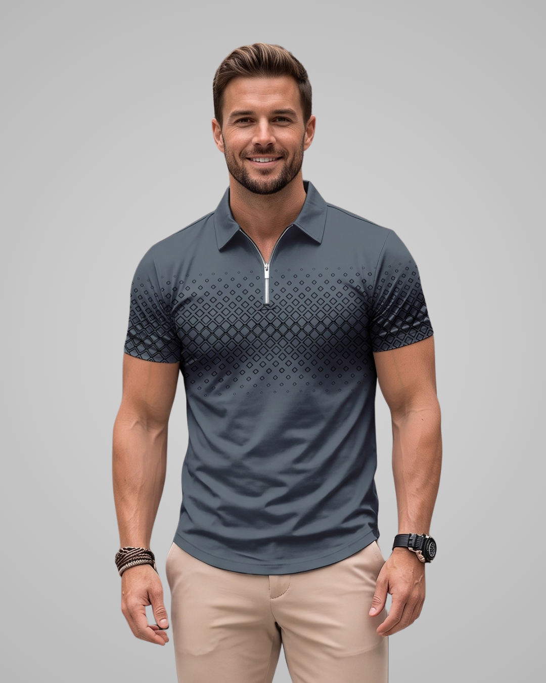 A man modeling a short-sleeve polo shirt with a half-zip collar. The shirt features a geometric diamond pattern that fades into solid dark gray at the sleeves.