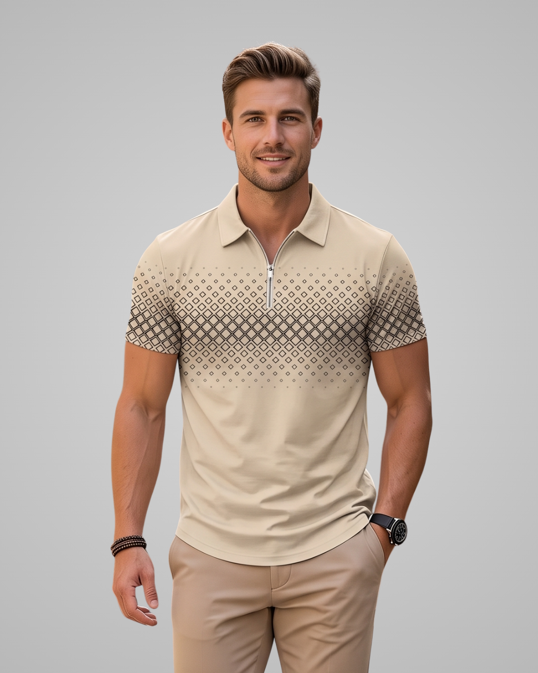 A man wearing a beige short-sleeve polo shirt with a geometric pattern gradient on the chest and sleeves, paired with khaki pants, against a solid gray background.