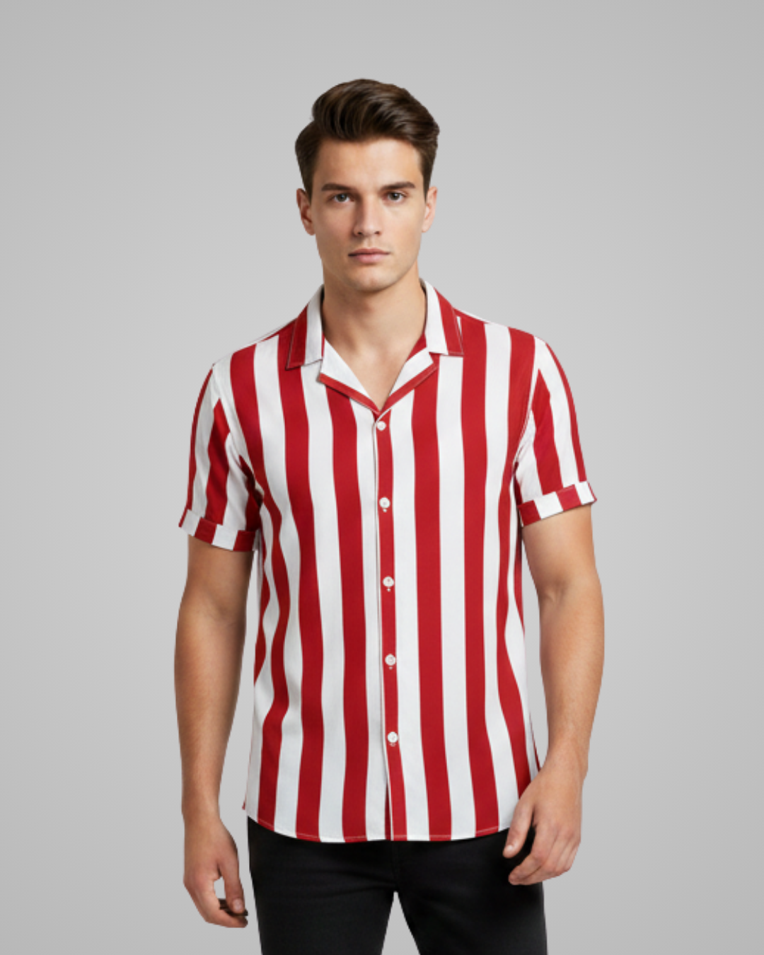 Man wearing a red and white striped shirt against a gray background