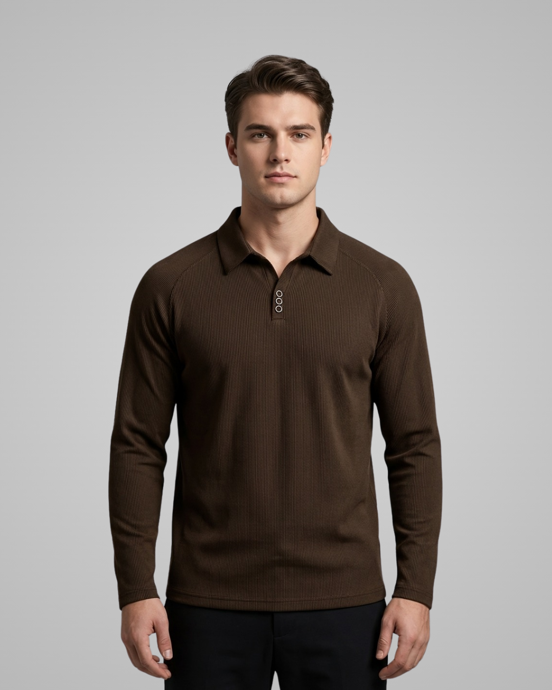 Man wearing a brown long-sleeve polo shirt against a gray background