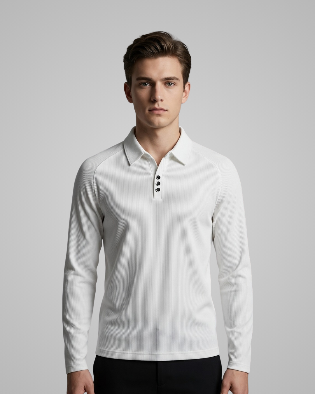 Man wearing a white long-sleeve polo shirt against a gray background