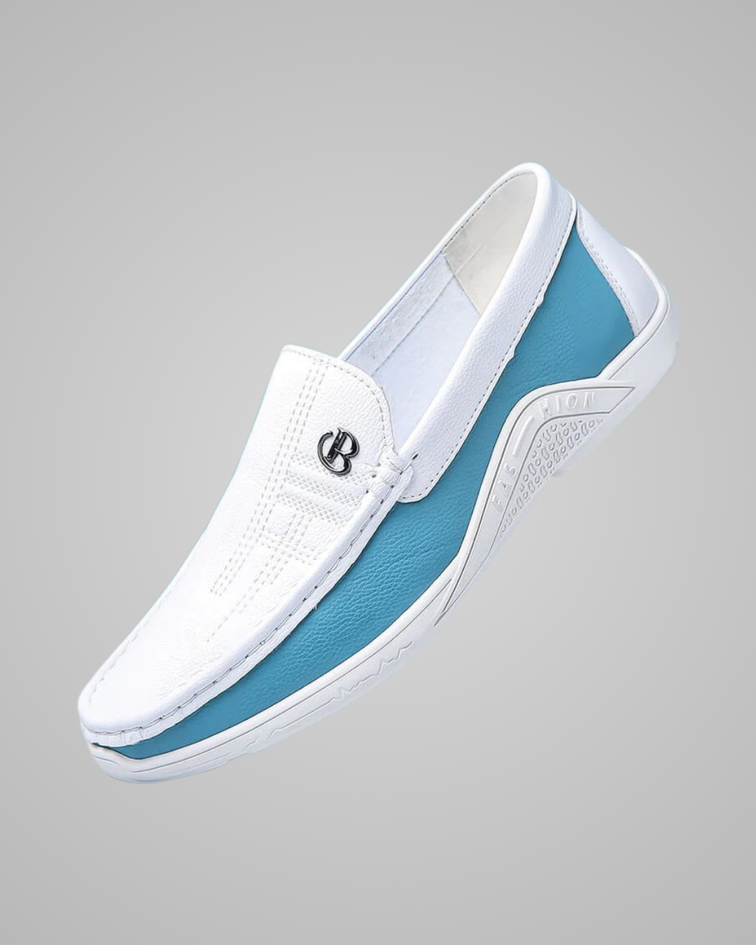 A white slip-on wedge shoe with a light blue side panel and a small silver logo emblem on the side, shown against a solid gray background.