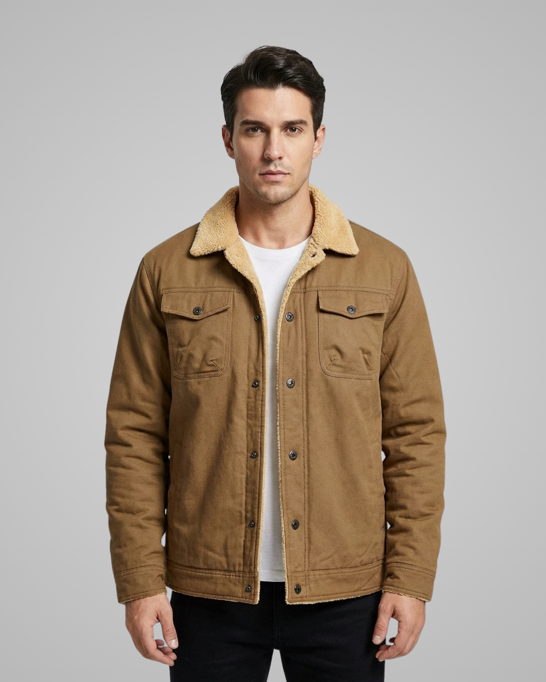 Man wearing a brown jacket with a gray background