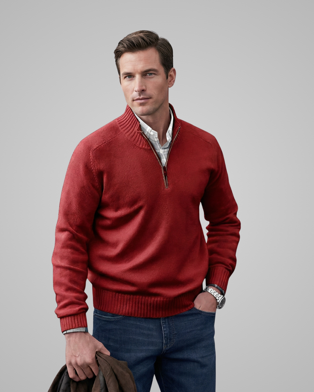 Man wearing a red sweater with a gray background