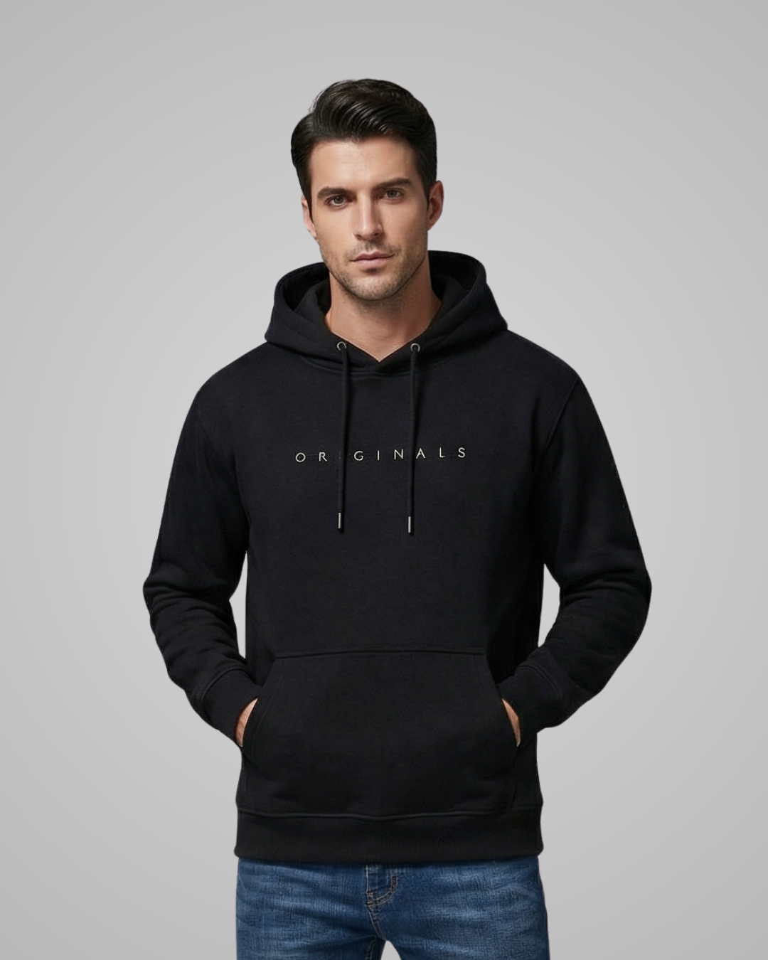 Man wearing a black hoodie with 'ORIGINALS' text on a gray background