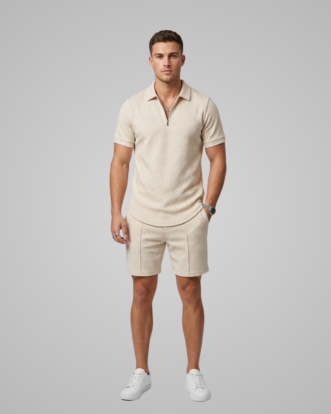 Man wearing a beige textured polo shirt and shorts set on a gray background