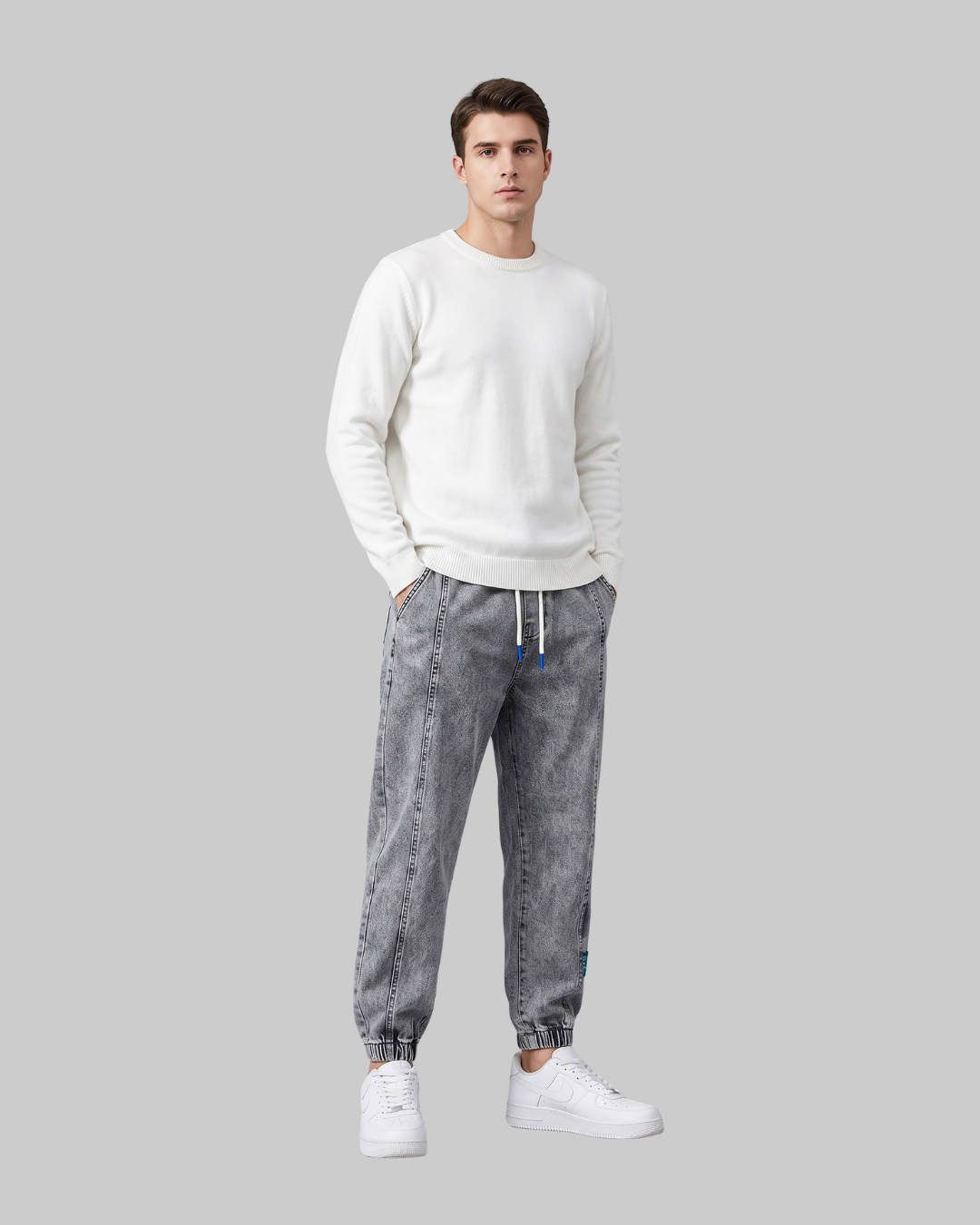 Men's Elastic Waist Jogger Jeans in grey.