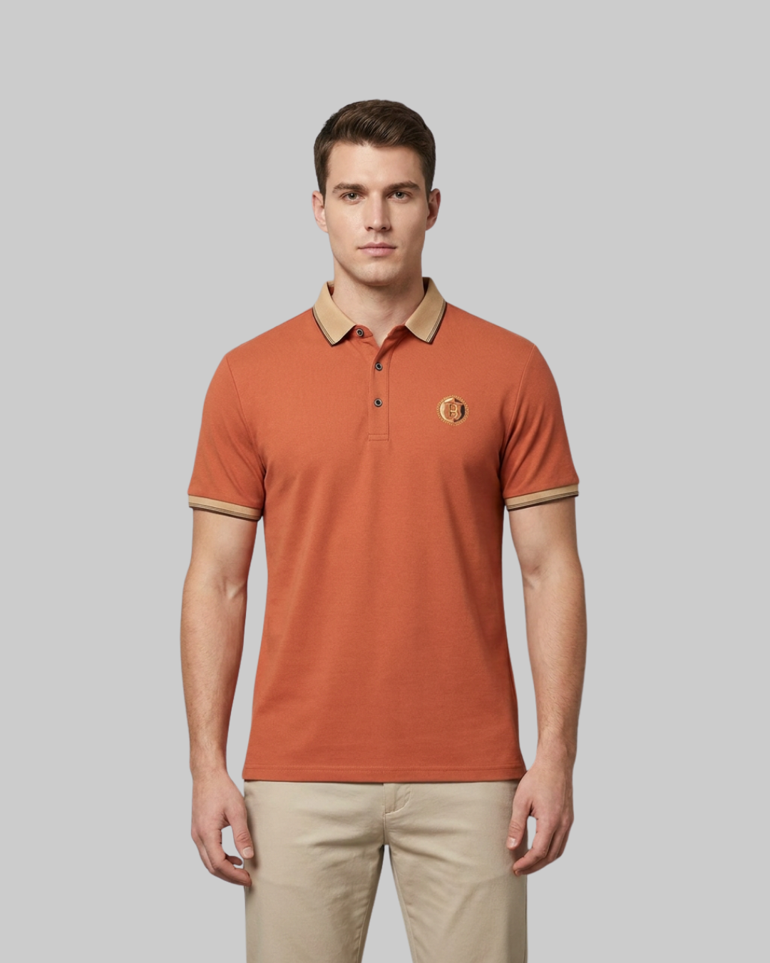 Men's Embroidered Pique Polo Shirt in orange.