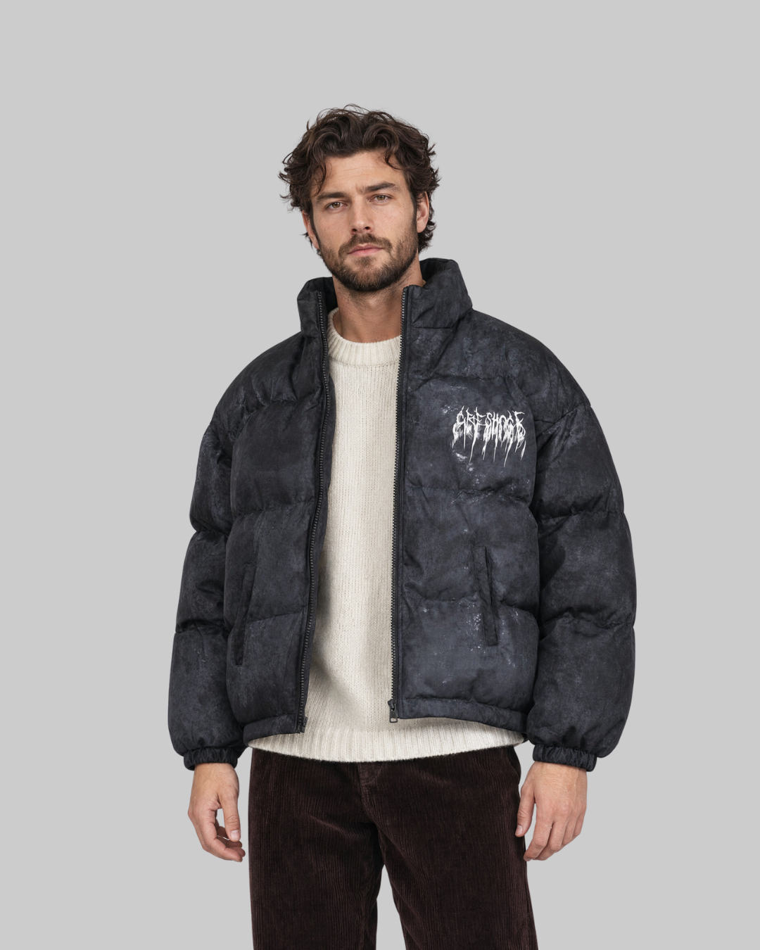 Men's Graphic Puffer Jacket in black.