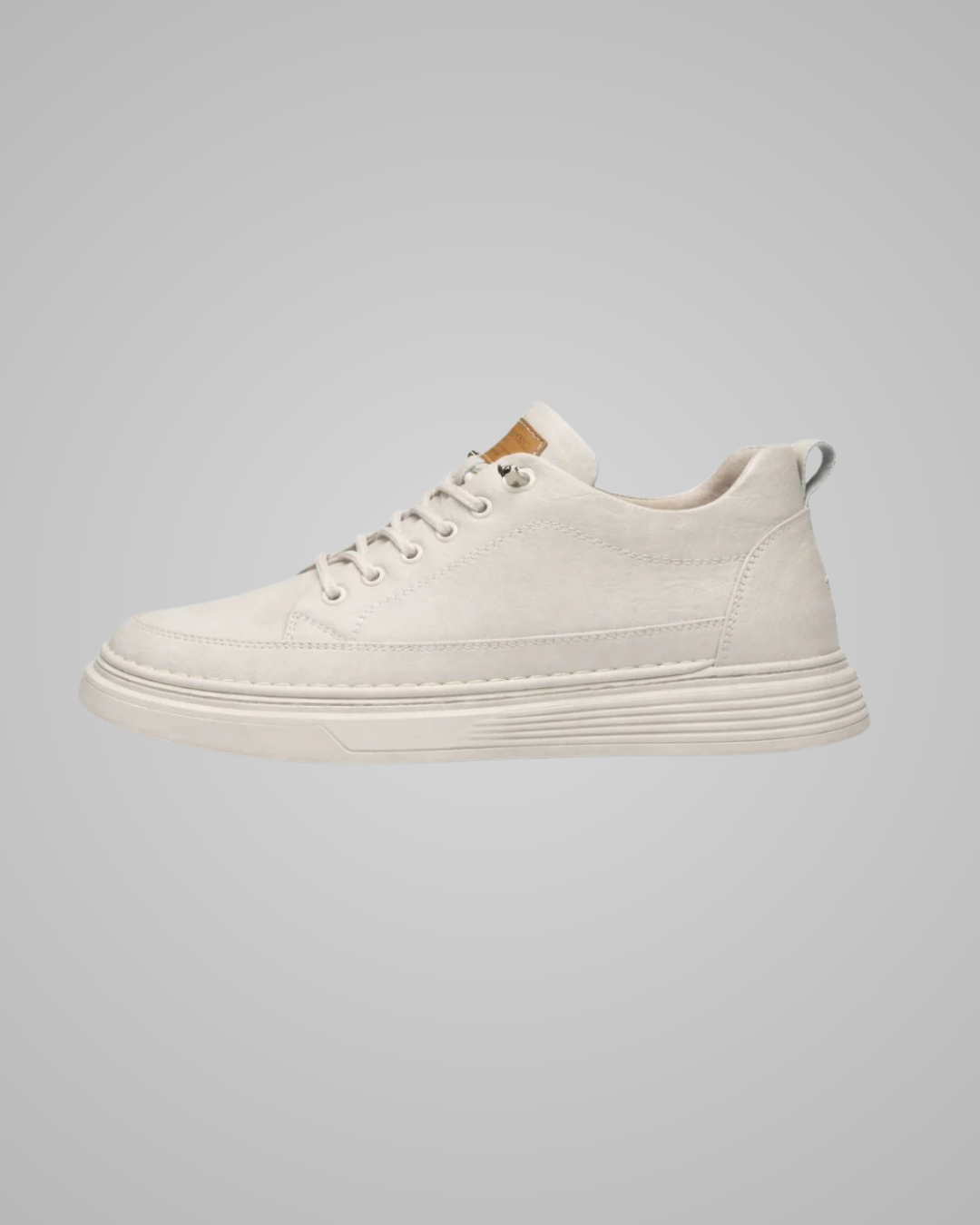 White sneaker on a gray background