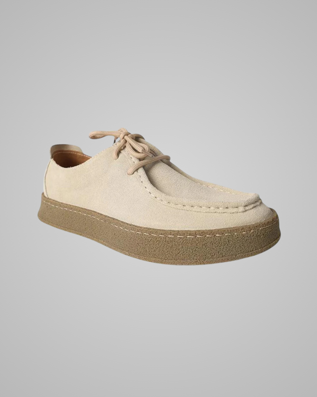 Beige casual shoe on a light gray background