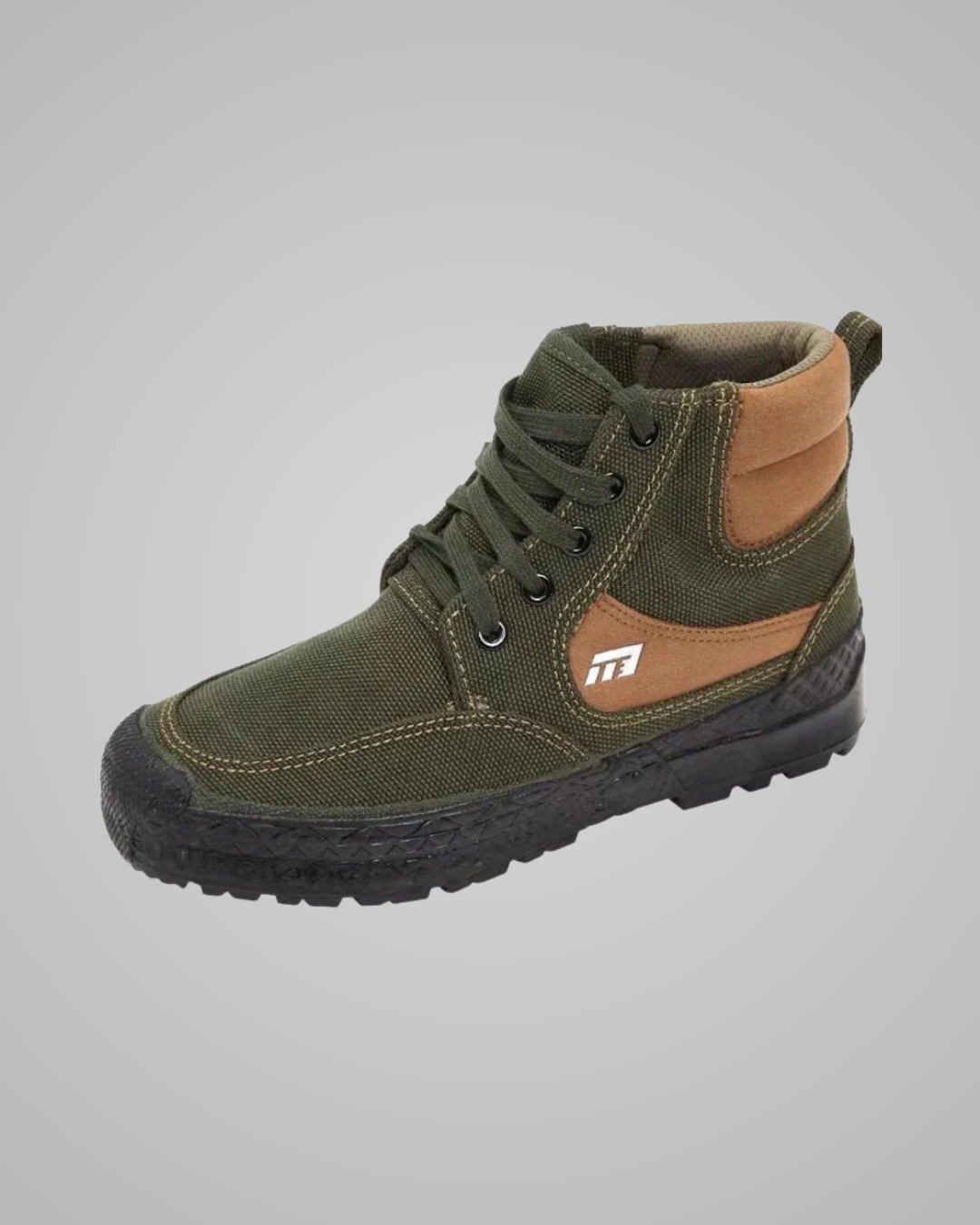 An olive green canvas lace-up boot with tan leather accents, a black sole, and a small white logo on the side, shown against a plain gray background.