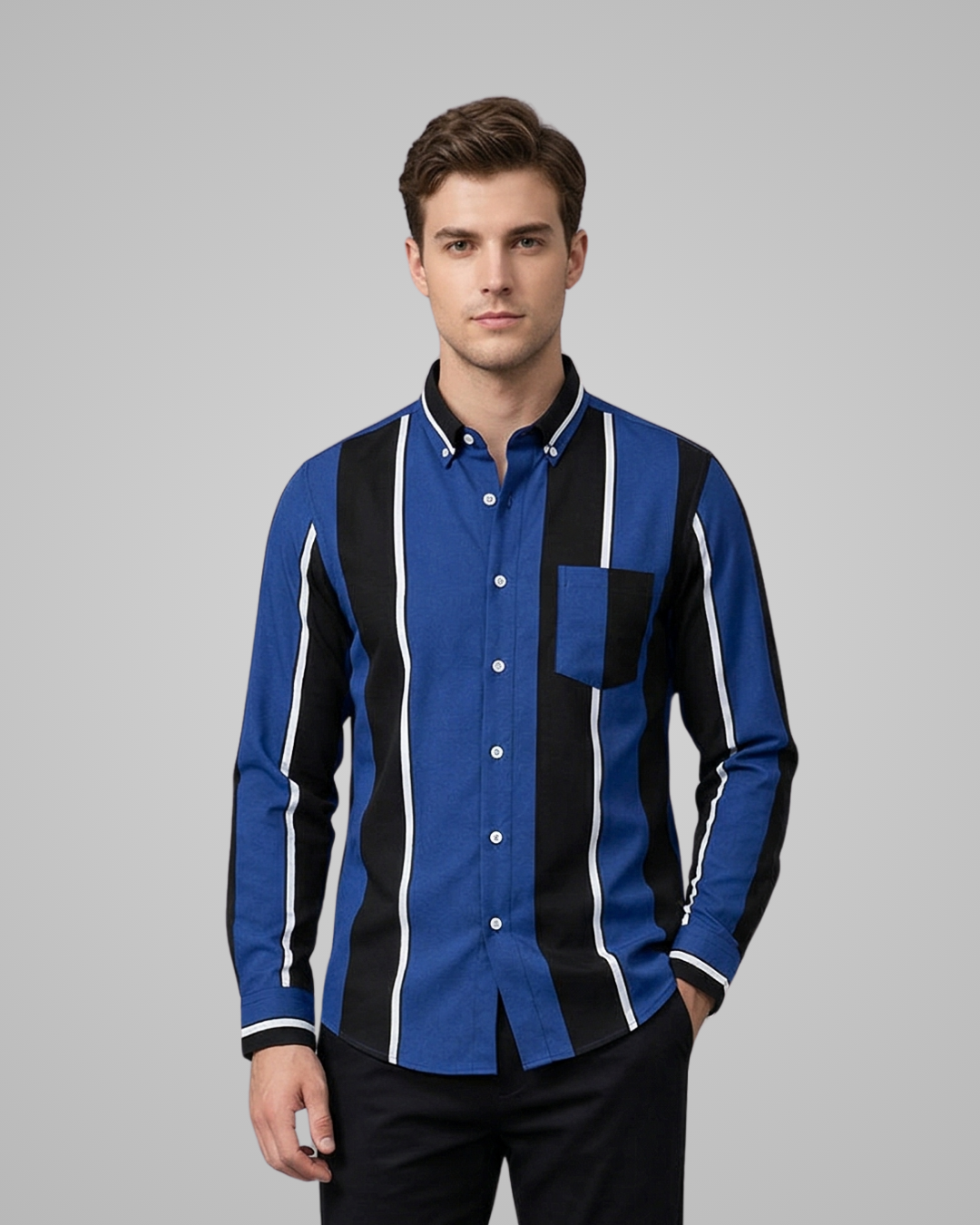 Man wearing a blue and black striped shirt on a gray background