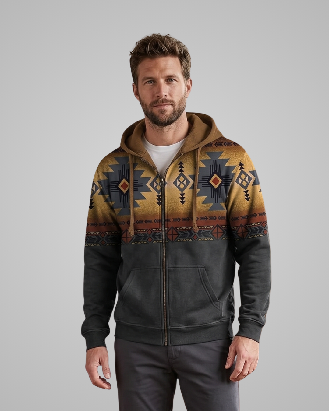 Man wearing a hoodie with a geometric pattern on a gray background