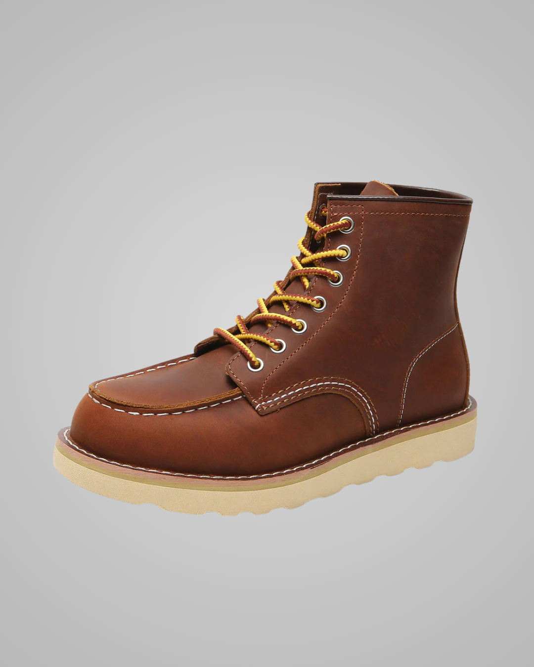 A single brown leather lace-up boot with tan laces and a light beige sole, shown against a solid gray background.