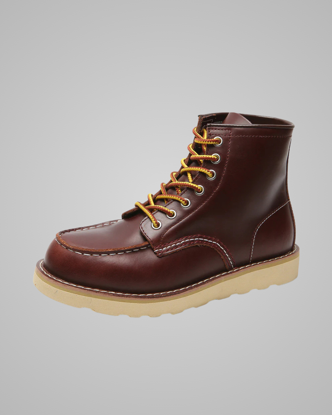 A single dark brown leather lace-up boot with tan laces and a light beige sole, shown against a solid gray background.
