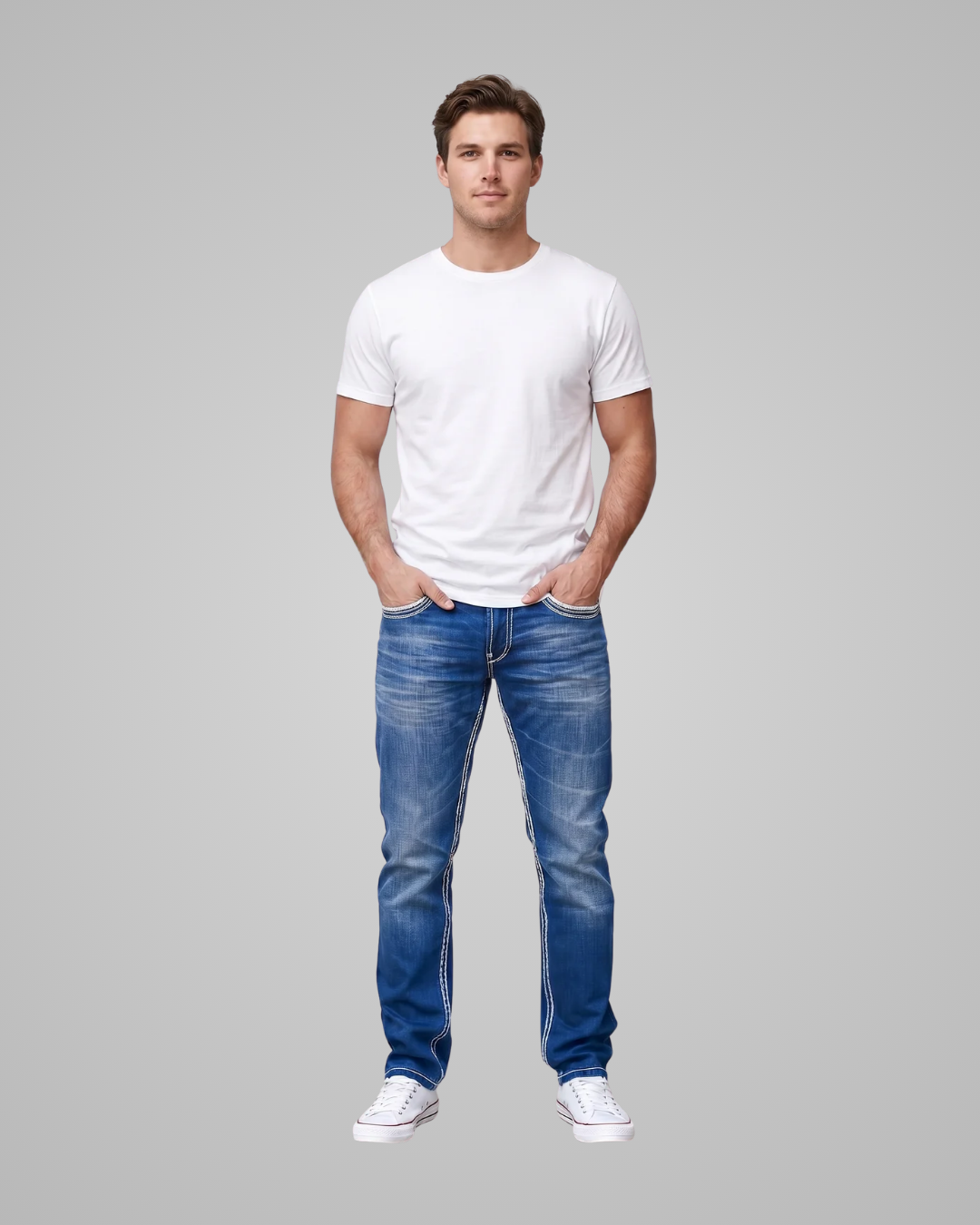Man wearing a white t-shirt and blue jeans on a gray background