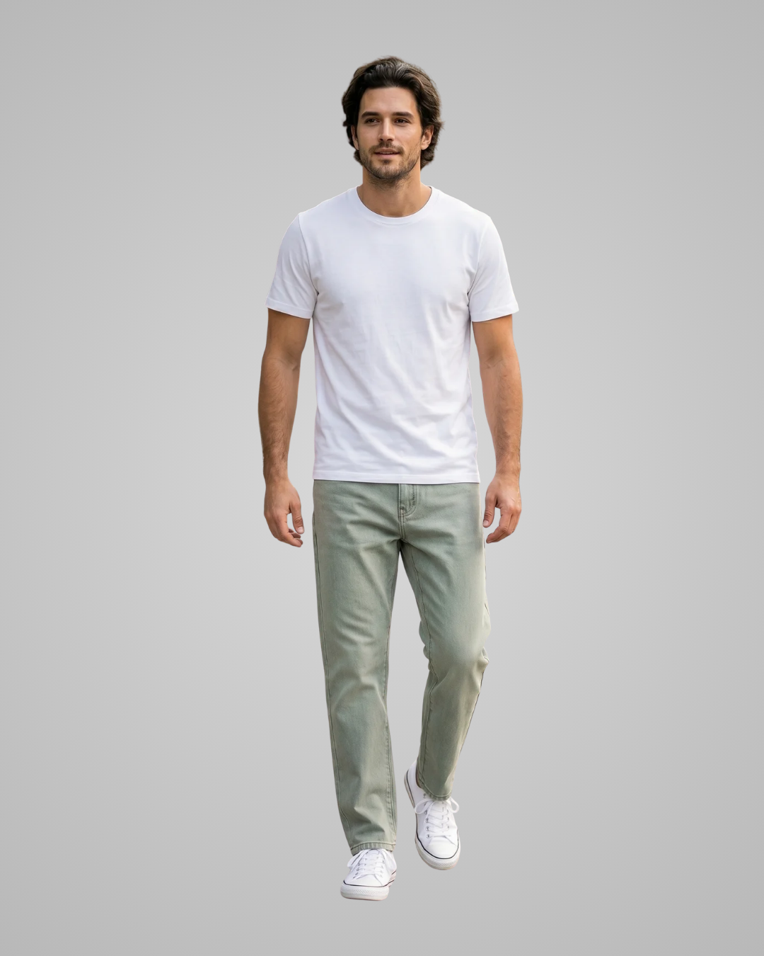 Man wearing a white t-shirt and light green pants on a gray background