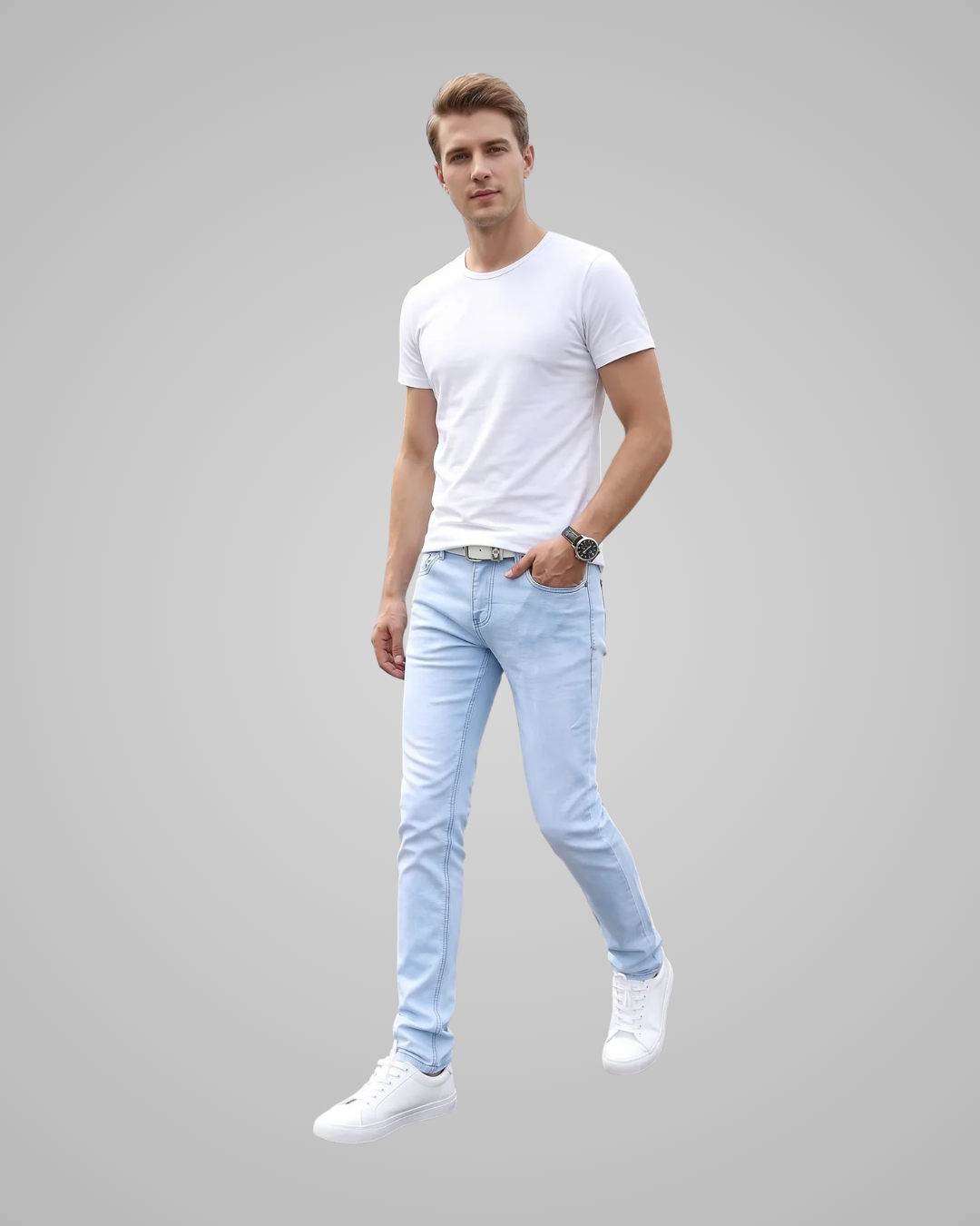 Man wearing a white t-shirt and light blue jeans on a gray background
